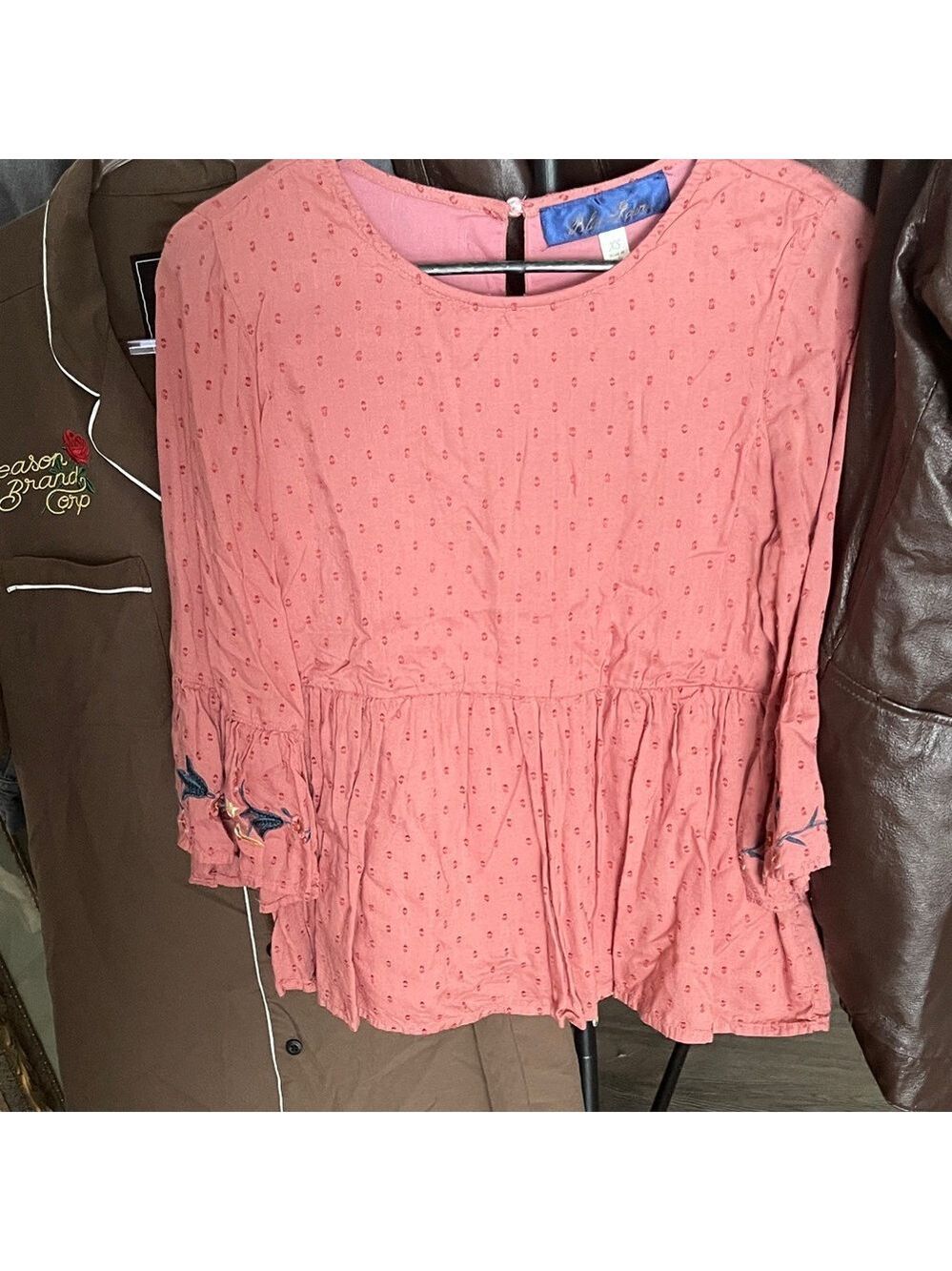 Elegant Pink Blouse with Peplum Detail